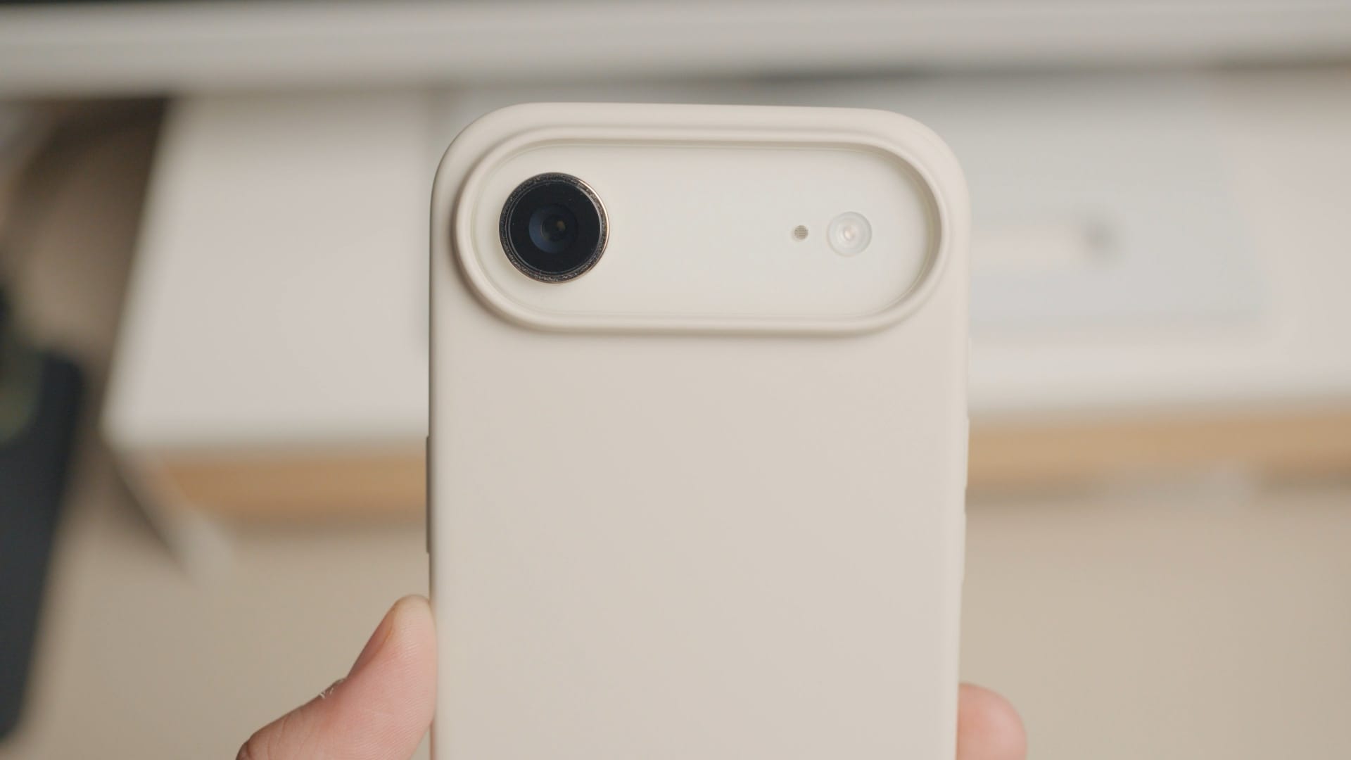 beats case on iPhone Air with a blurred background