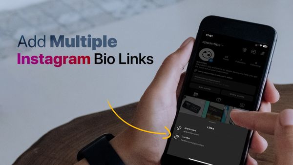 Hand holding iPhone showing multiple Instagram bio links