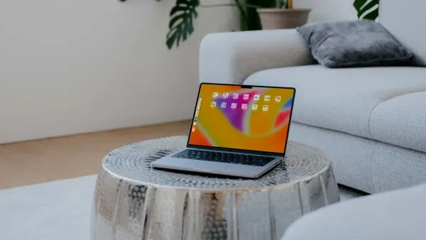 MacBook pro kept on table showing free apps