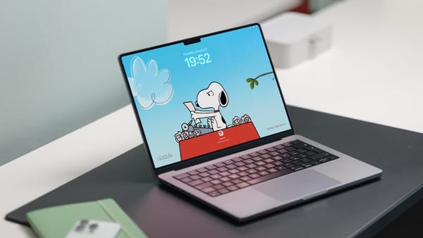 MacBook Pro showing Snoopy screensaver