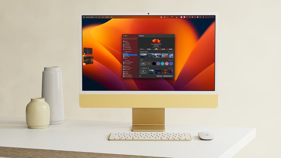 24-inch iMac in yellow color sitting on top of white desk