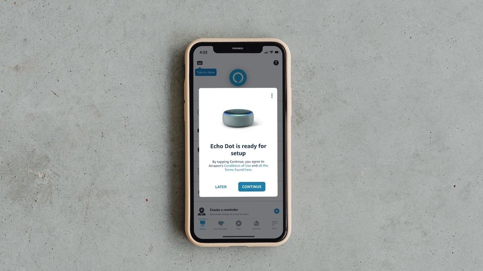 How to Set up Amazon Echo Speakers with iPhone - iPhone on floor showing Echo Dot setup screen