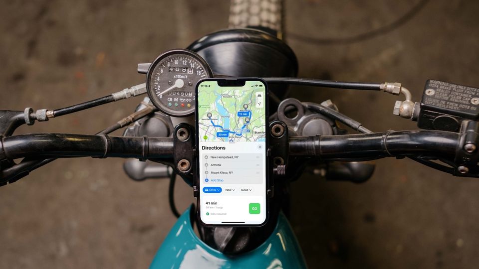 Apple iPhone attach to a motorbike and showing multi-stop routing in Apple Maps