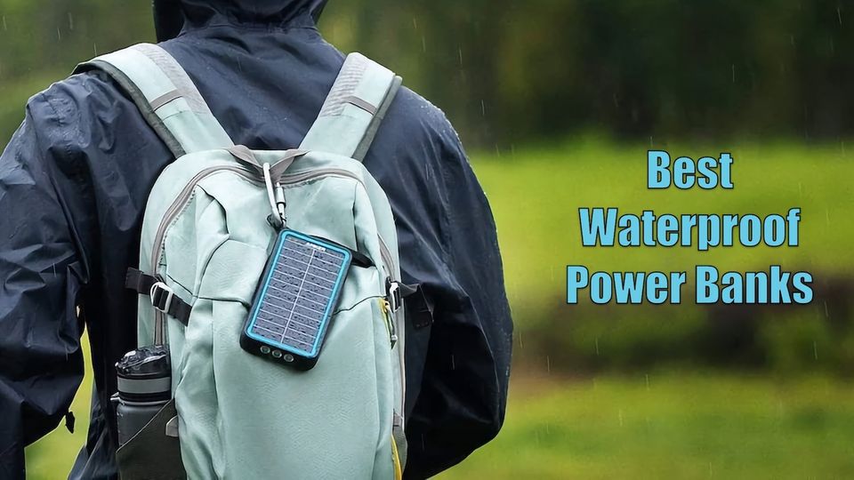Man standing in rain with a waterproof power bank attached to his backpack
